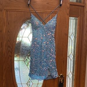 Homecoming short dress. Wore once. Perfect condition. Looks brand new. Open back